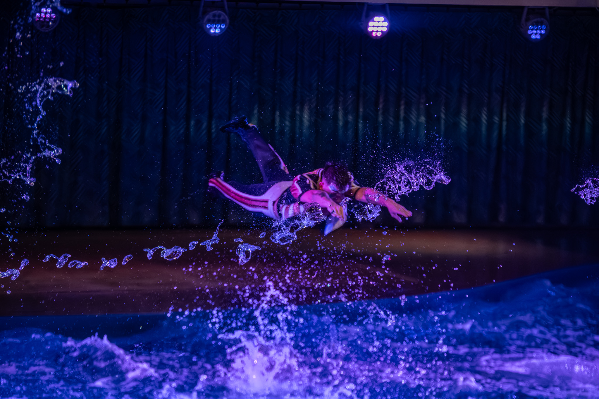 Group performance in the water with intense blue motion